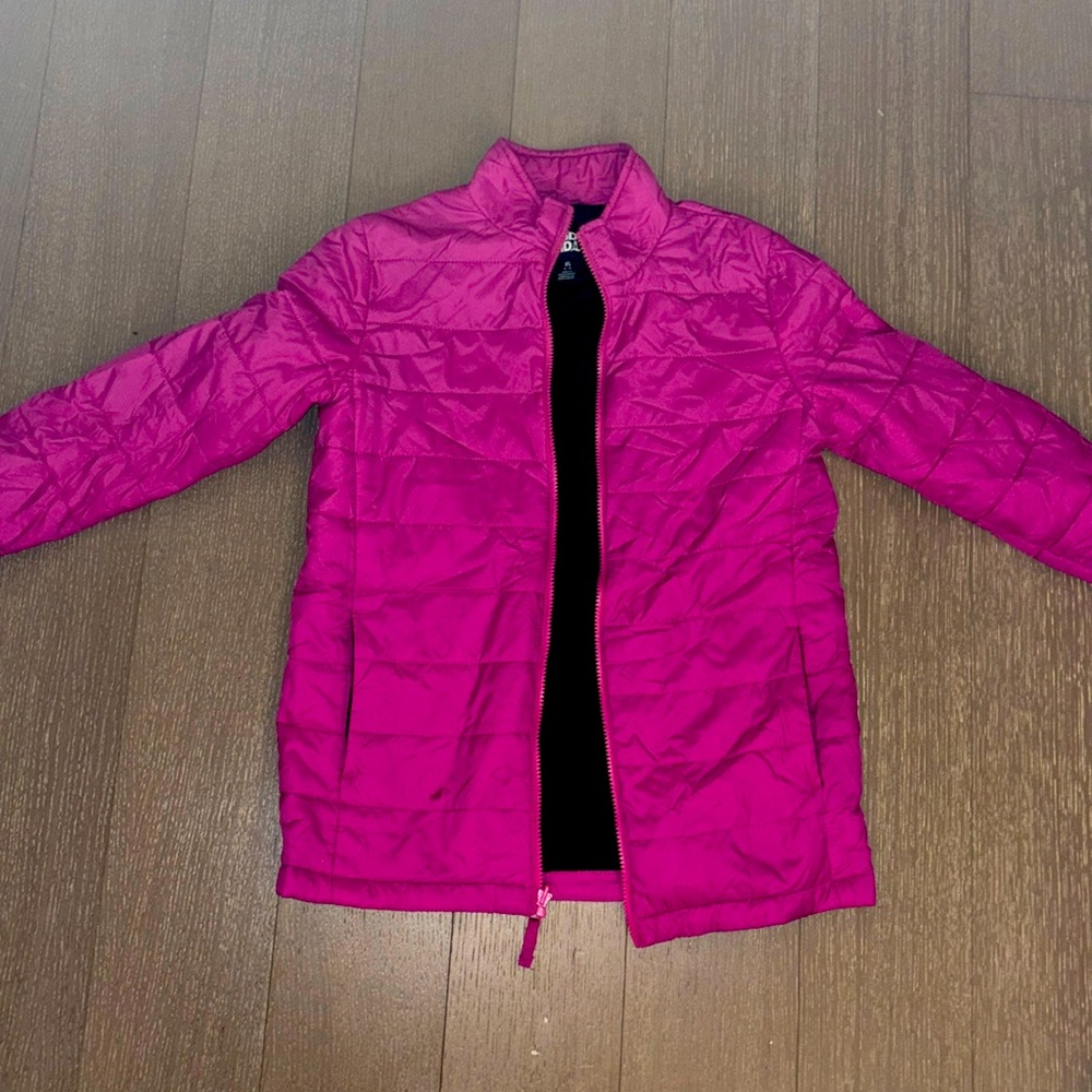 Lands and super lightweight, packable, pink jacket